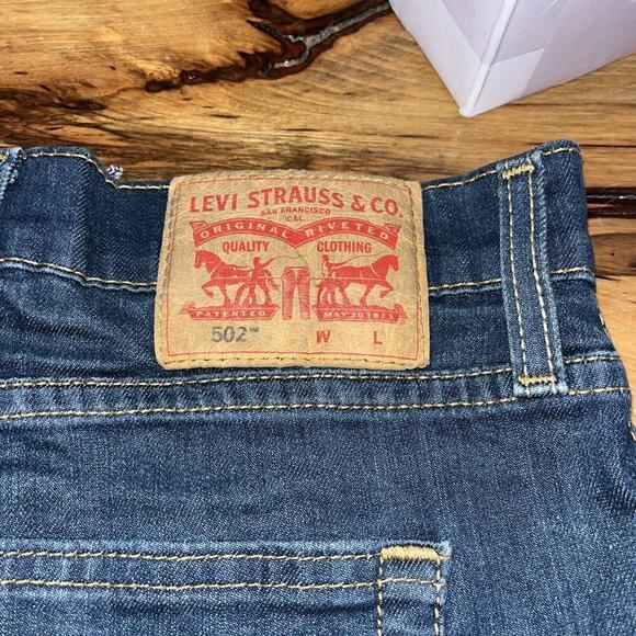 Levi's 52 x 32  502 Taper Leg Blue Jeans Flex Denim Regular Fit Below Waist - Picture 1 of 5